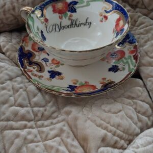 Elegant Floral Teacup and Saucer Set with Gold Accents